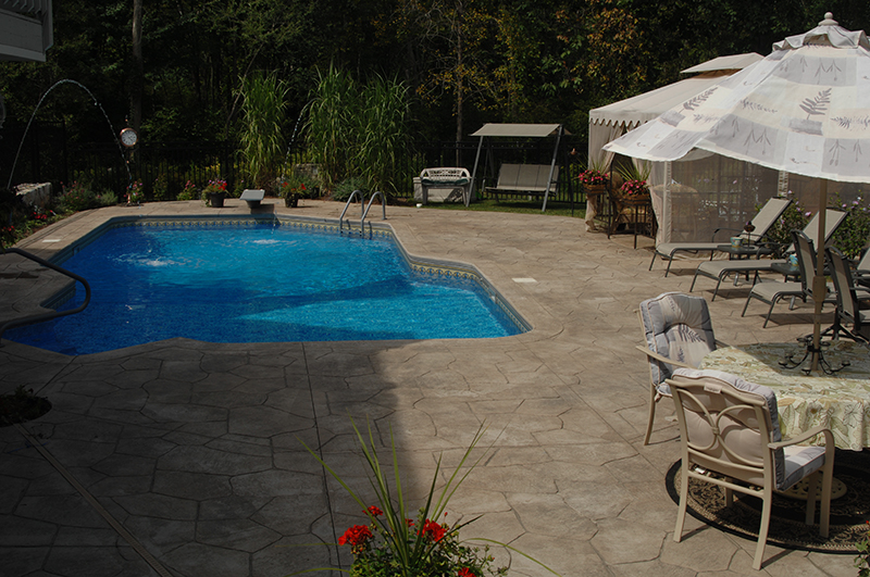 Swimming pool and stamped concrete project example 114